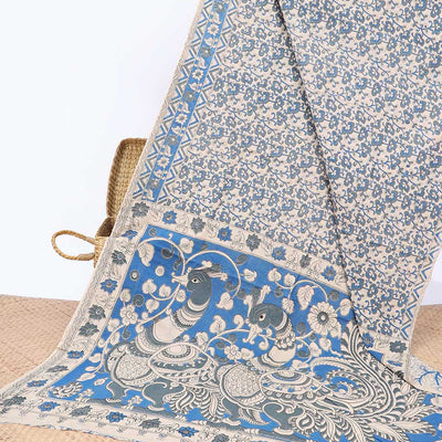 Blue floral machine-printed kalamkari cotton saree, floral border & peacock pallu