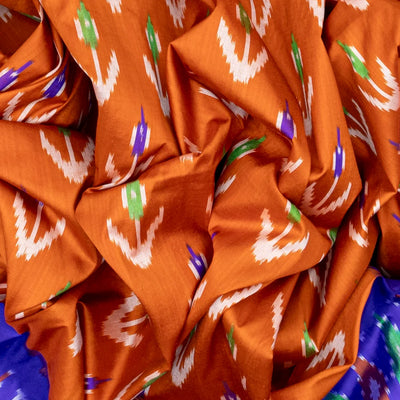 Orange Handloom Ikat Silk Saree With Contrast Purple Border