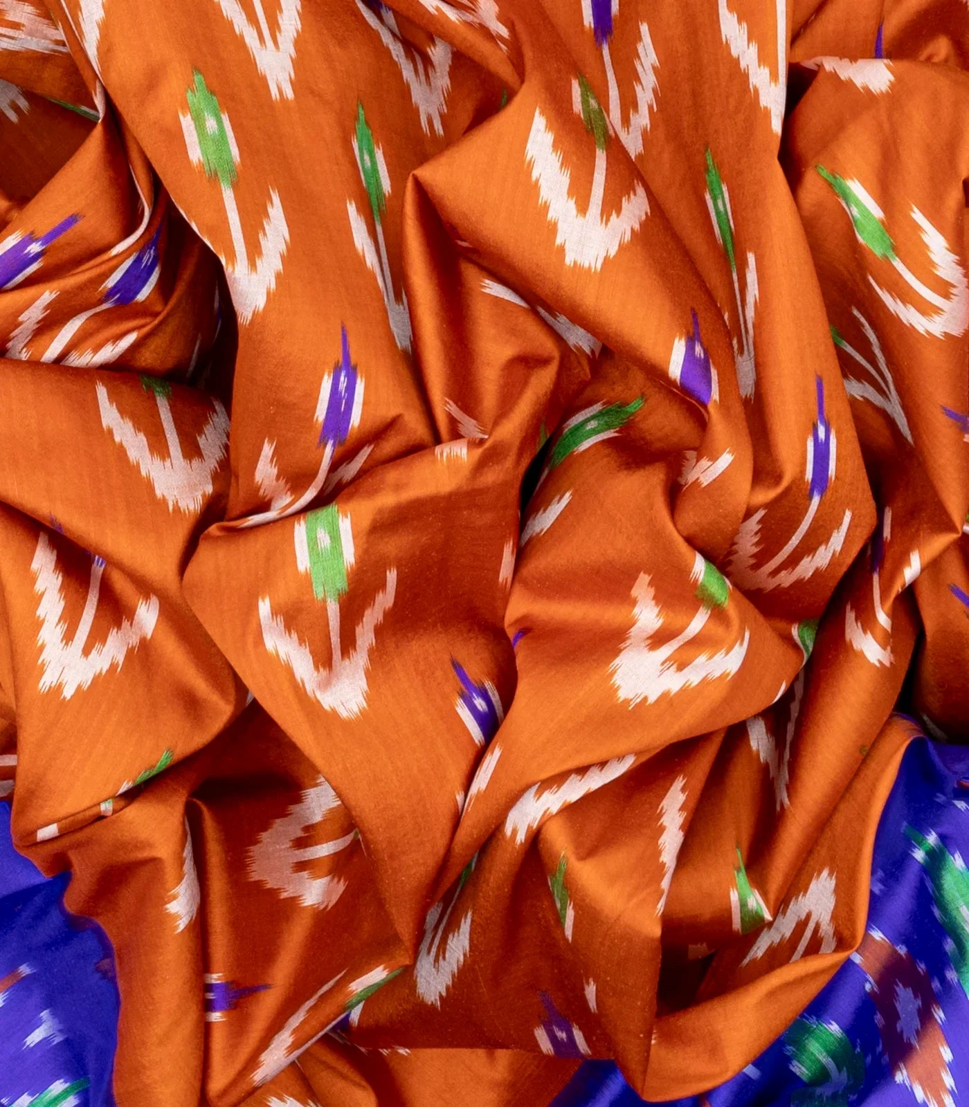 Orange Handloom Ikat Silk Saree With Contrast Purple Border