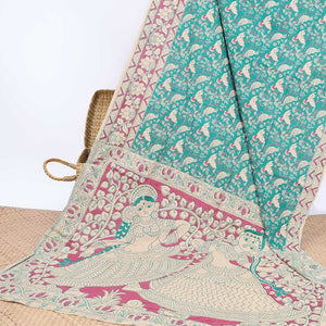 Blue floral & bird machine-printed kalamkari cotton saree, contrast floral border & human figurines pallu