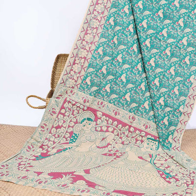 Blue floral & bird machine-printed kalamkari cotton saree, contrast floral border & human figurines pallu