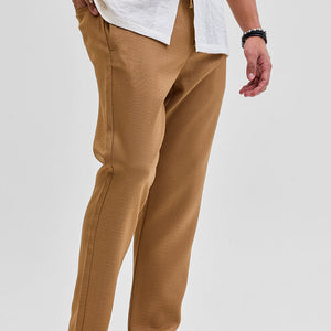 Brown Self-Design Slim Fit Trousers