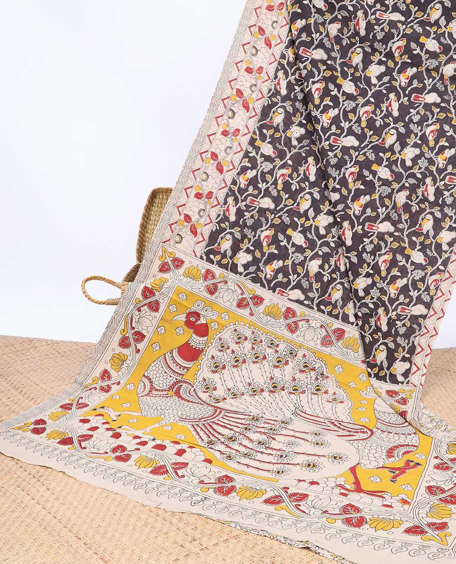 Brown floral & bird machine-printed kalamkari cotton saree, contrast floral & chevron border & peacock pallu
