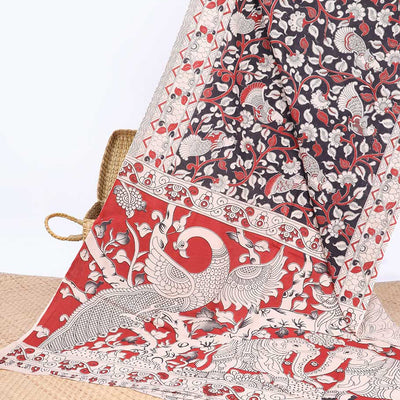 Brown floral & peacock machine-printed kalamkari cotton saree, contrast floral border & animal motifs pallu