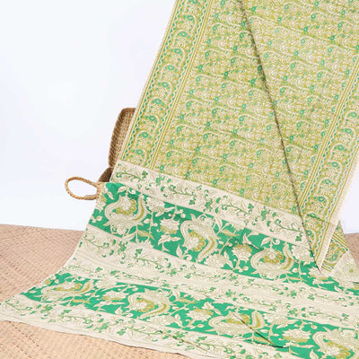 Green intricately machine-printed kalamkari cotton saree, self-border & contrast pallu of floral print