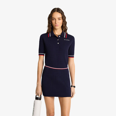 SPORTY & RICH | SERIF LOGO MINI CABLE SKIRT { NAVY