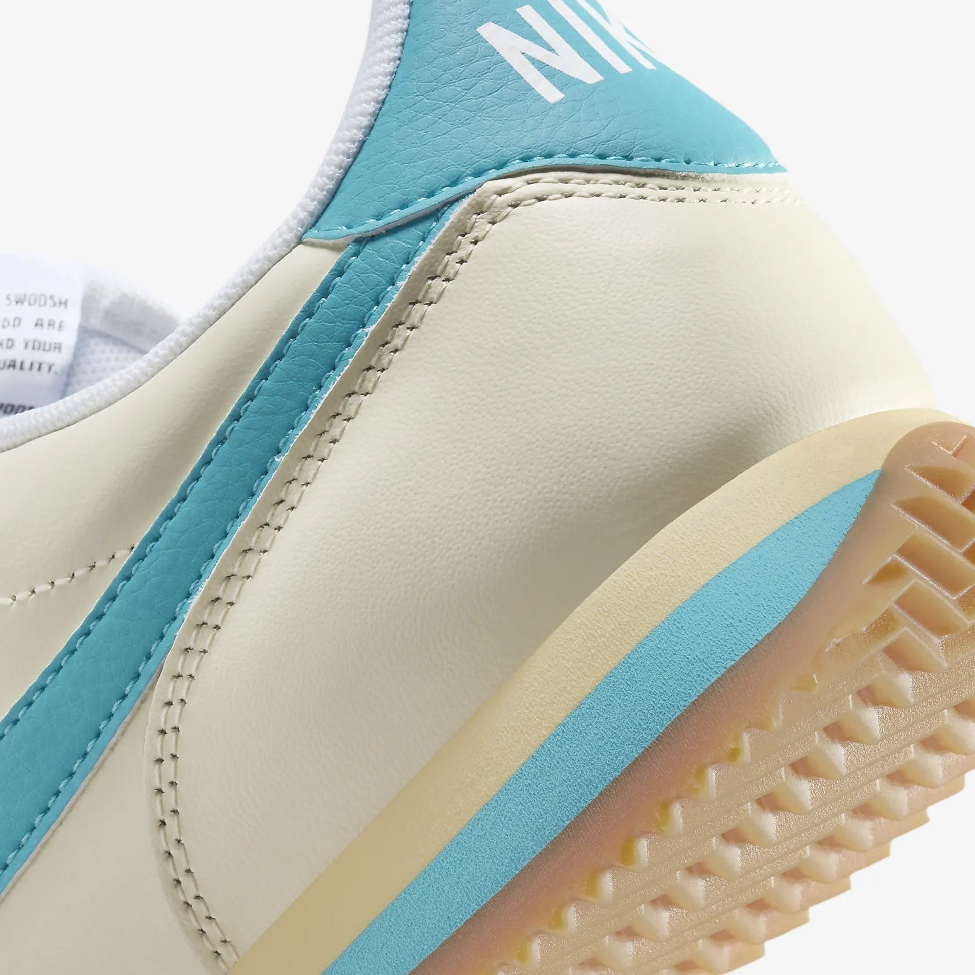 Nike | CORTEZ TXT  { COCONUT MILK/TEAL NEBULA-GUM YELLOW