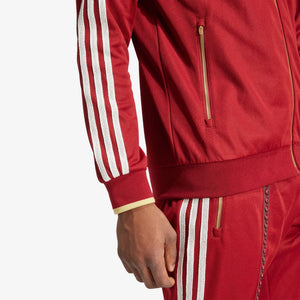 ADIDAS ORIGINALS | RETRO SPORTS CRICKET-INSPIRED TRACK TOP { RUST RED