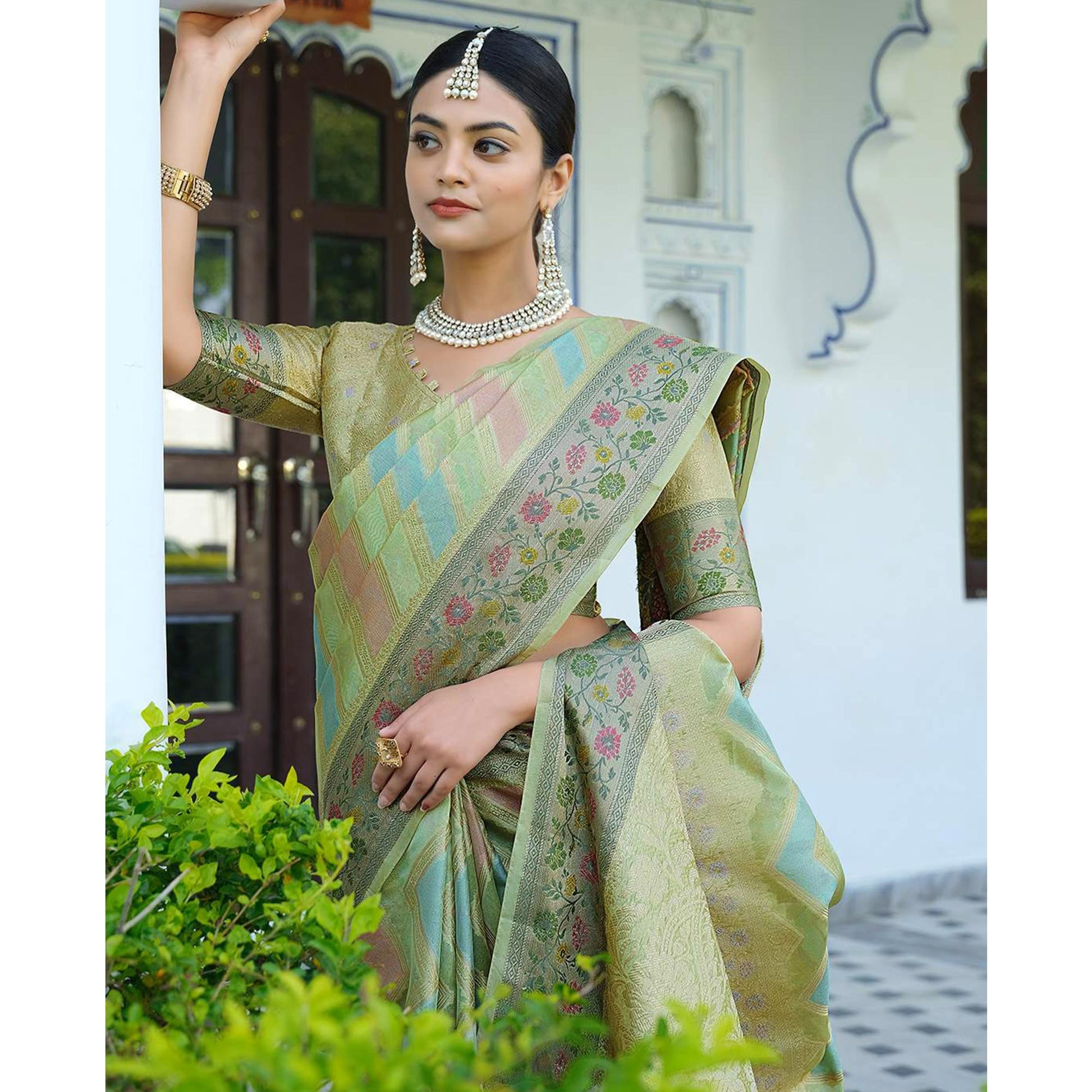 green-woven-organza-saree-with-tassels-25