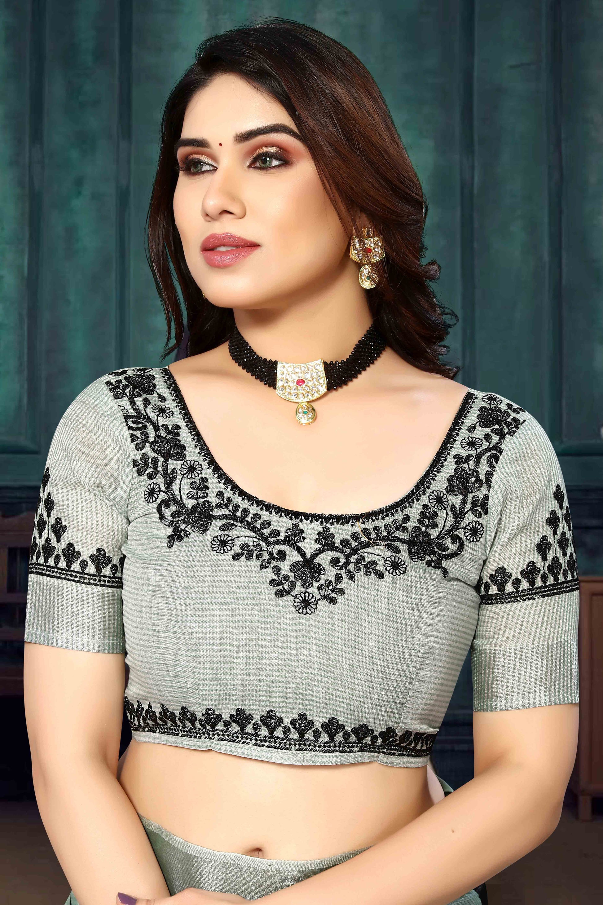 green-embroidered-linen-cotton-saree-with-zari-border