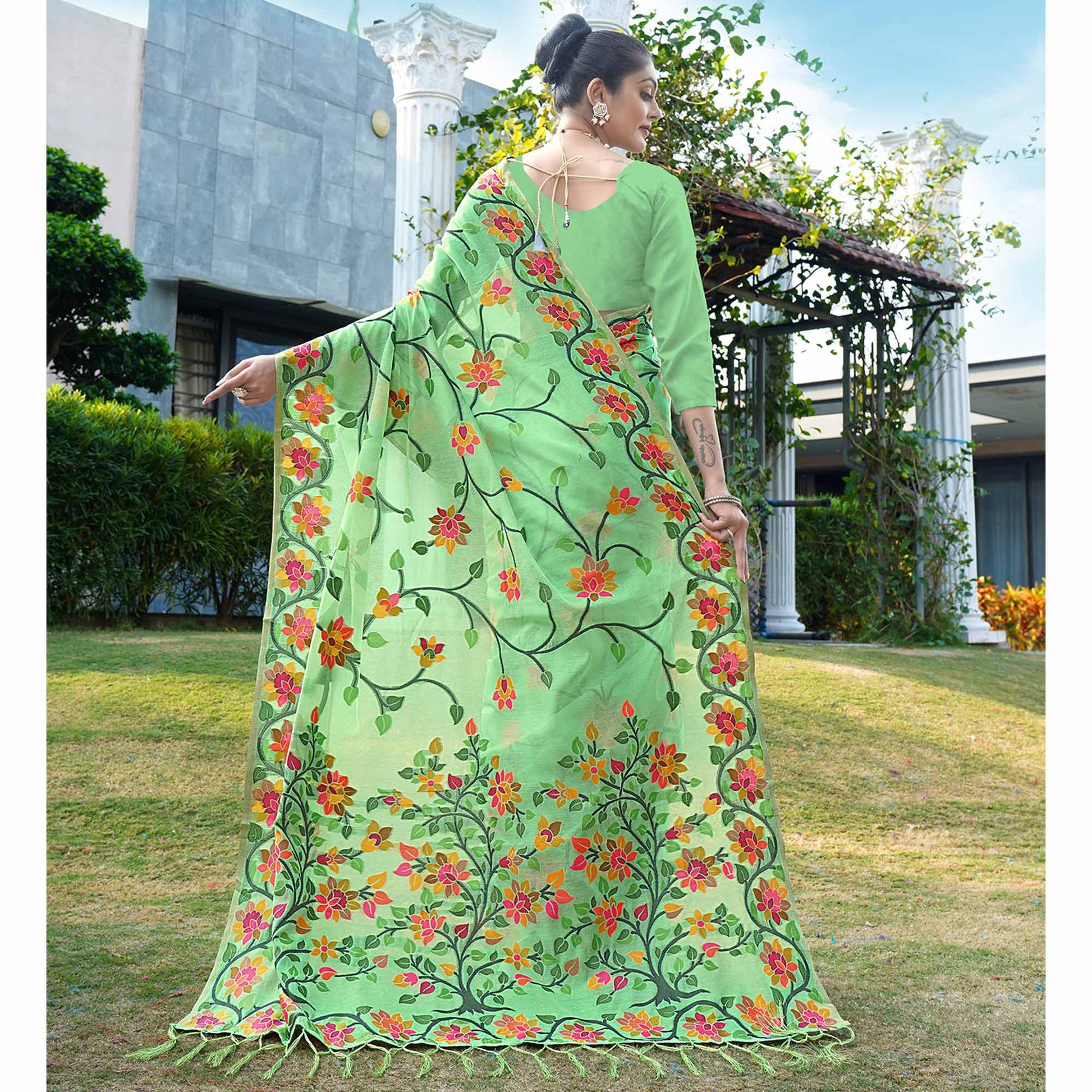 green-floral-woven-cotton-silk-saree-with-tassels-1