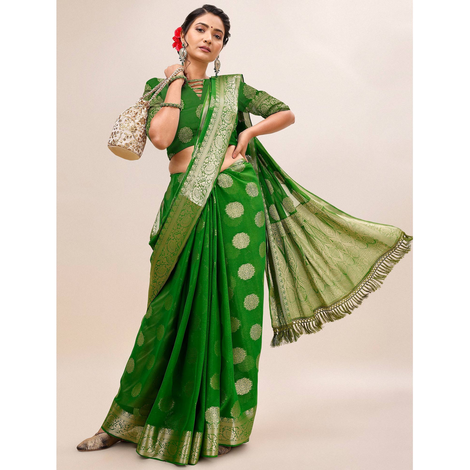 green-woven-chiffon-saree-with-tassels