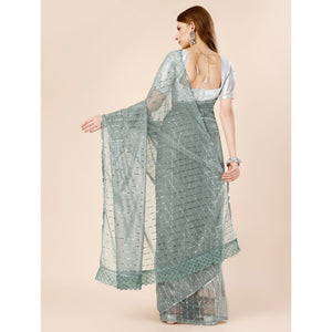 green-tikki-wor-lycra-saree-with-embroidered-border