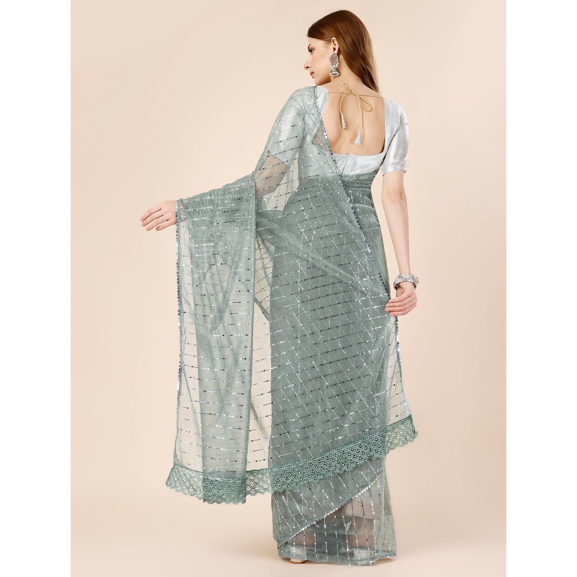 green-tikki-wor-lycra-saree-with-embroidered-border