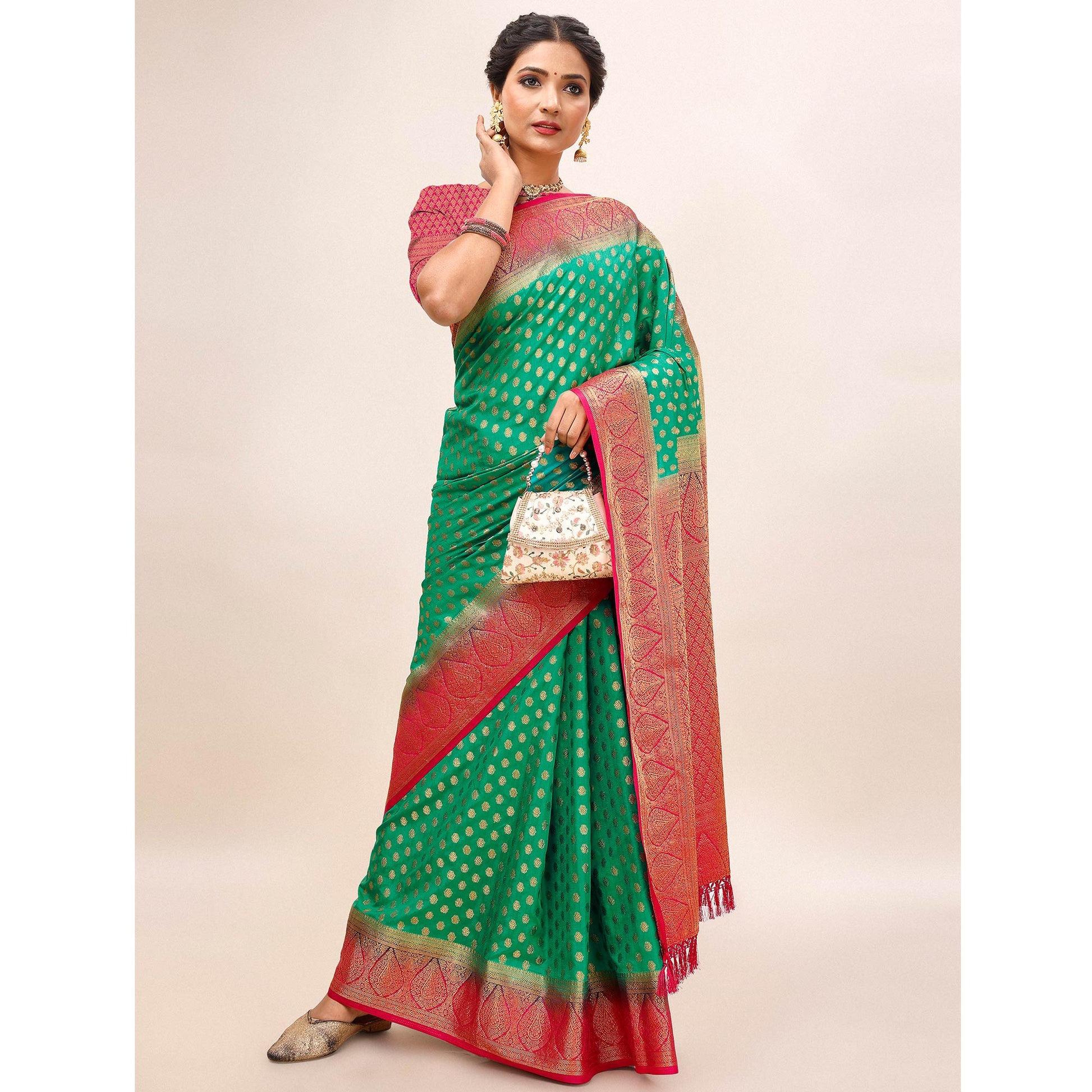 green-woven-dola-silk-saree-with-tassels