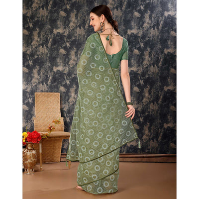 green-printed-with-zari-work-cotton-silk-saree-with-lace-border-1