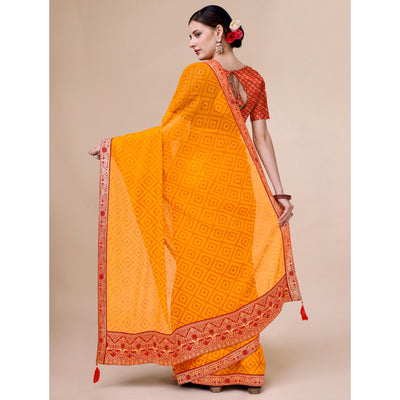 Bright Orange Bandhani Foil Printed Chiffon Saree With Tassels