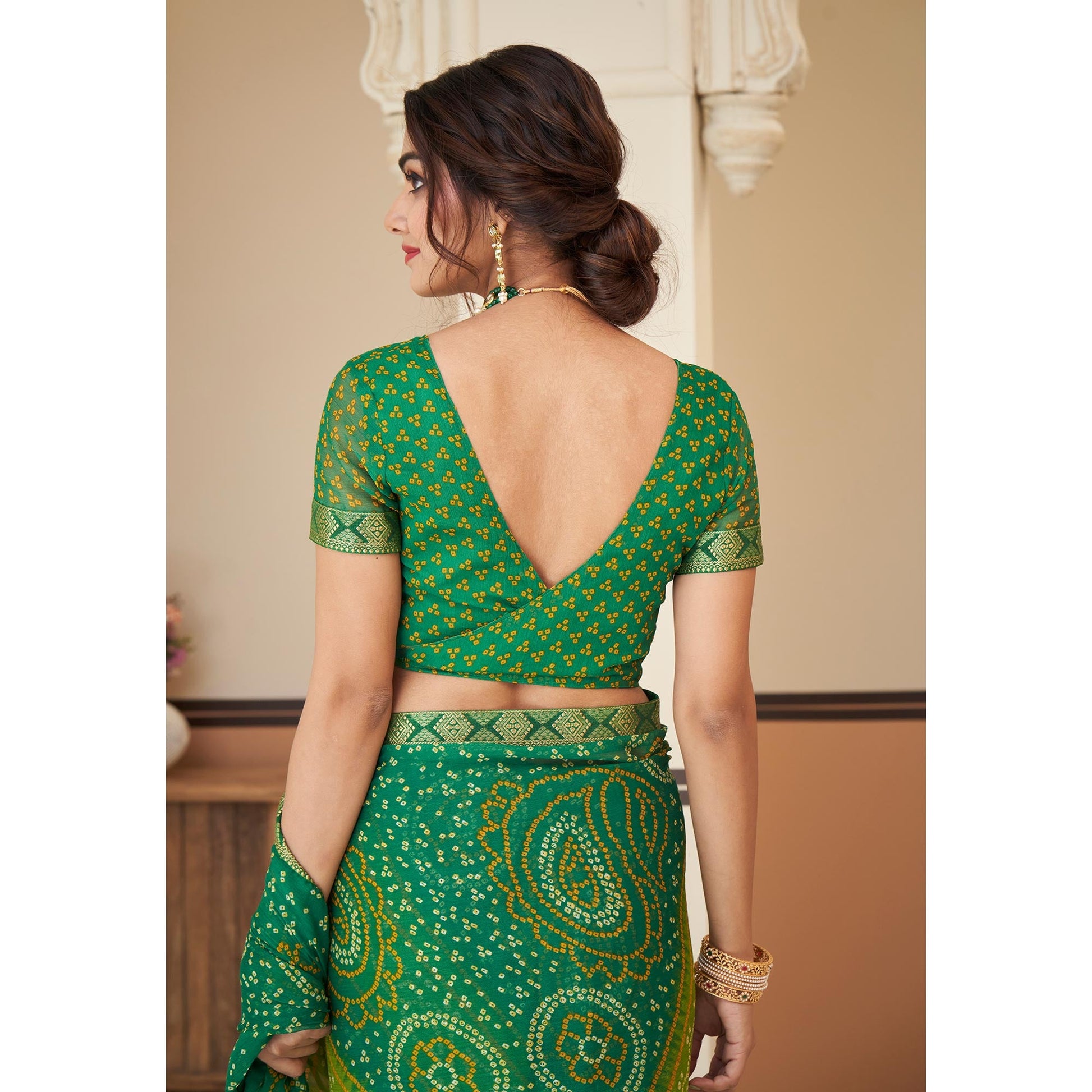 green-bandhani-printed-chiffon-saree-with-lace-border