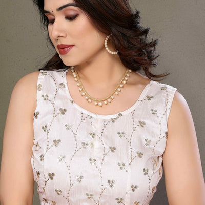 Light Orange Zari Woven Satin Saree With Pompom Border