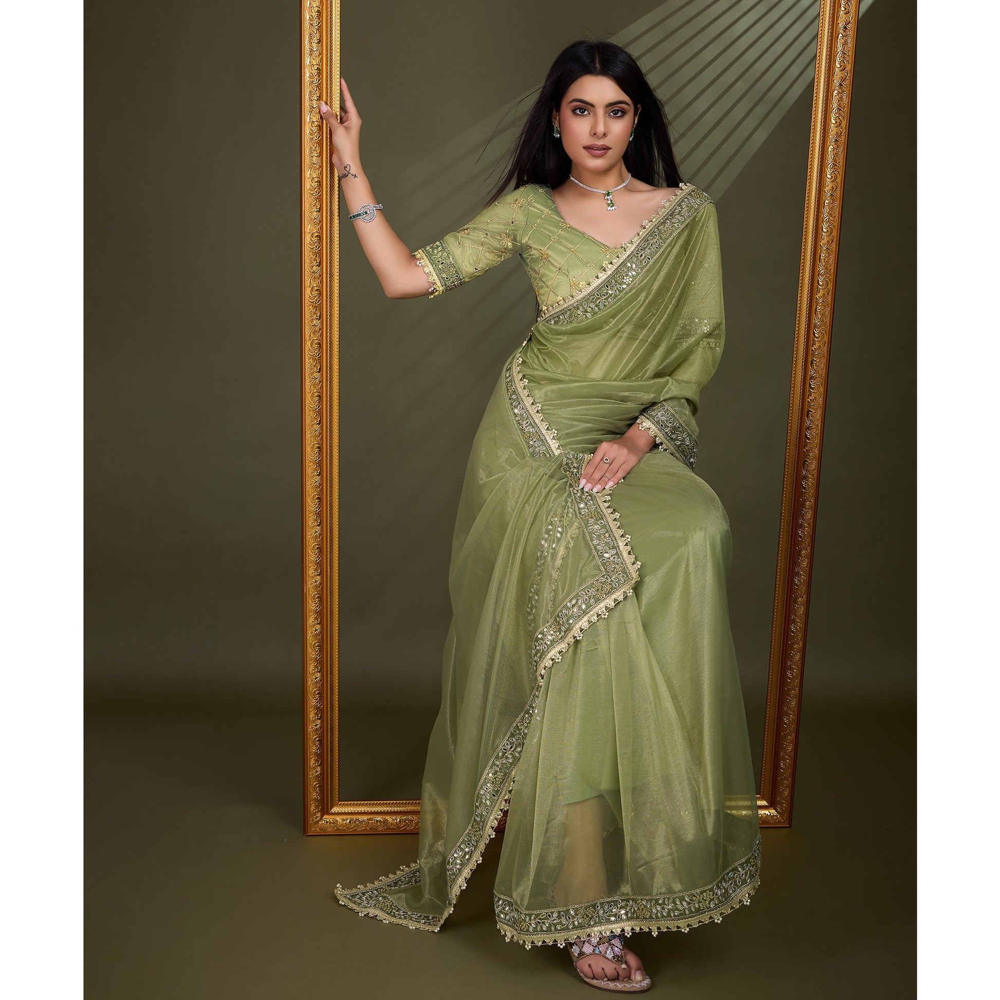 green-sequins-embroidery-with-mirror-handwork-twill-net-saree