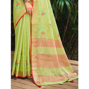 green-floral-embroidered-linen-saree-with-tassels-1