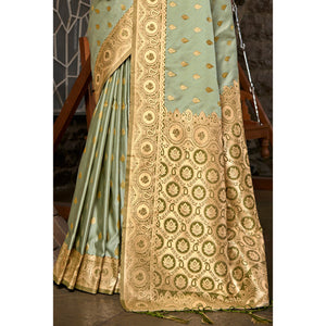 Light Green Woven Satin Silk Saree With Tassels