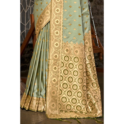 Light Green Woven Satin Silk Saree With Tassels