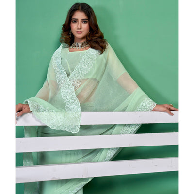 green-chiffon-saree-with-embroidered-border