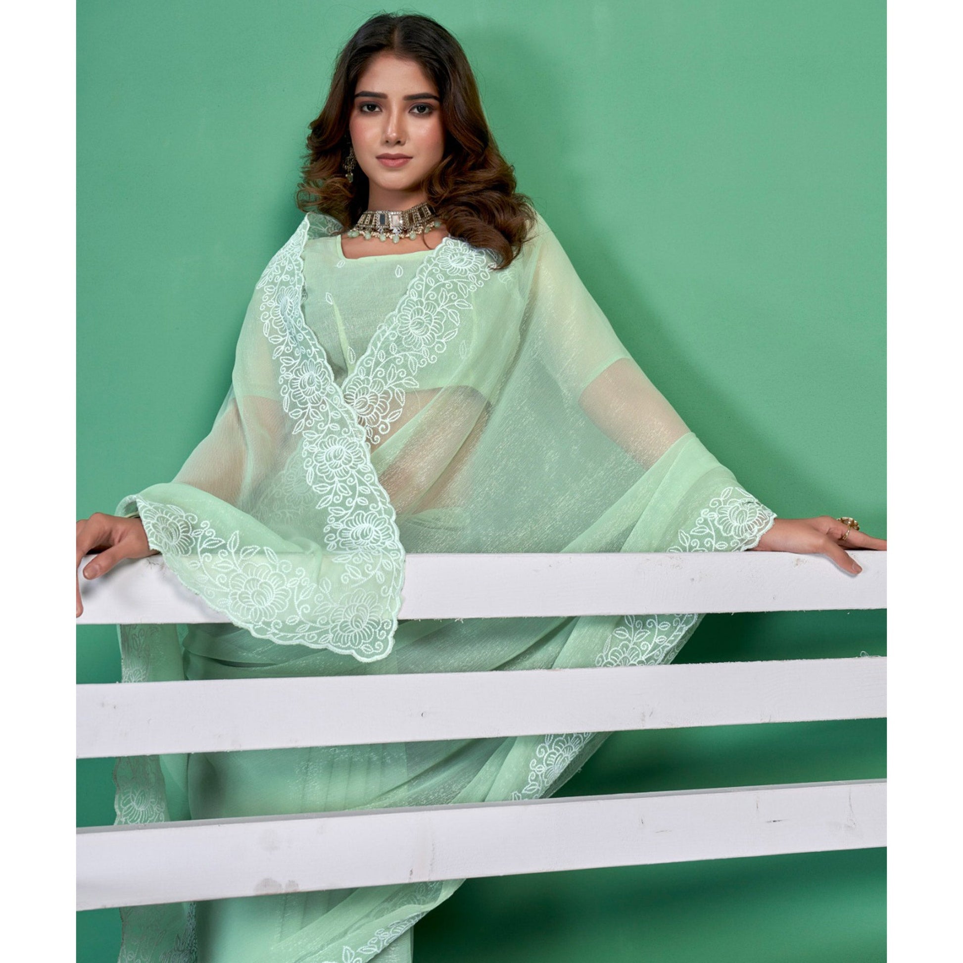 green-chiffon-saree-with-embroidered-border