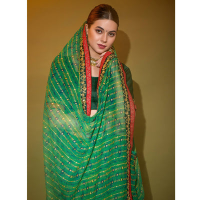 green-foil-printed-georgette-saree-with-embroidered-border