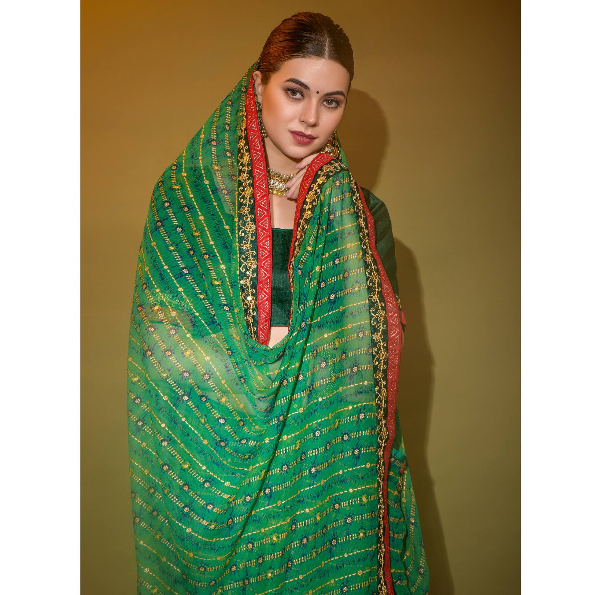green-foil-printed-georgette-saree-with-embroidered-border