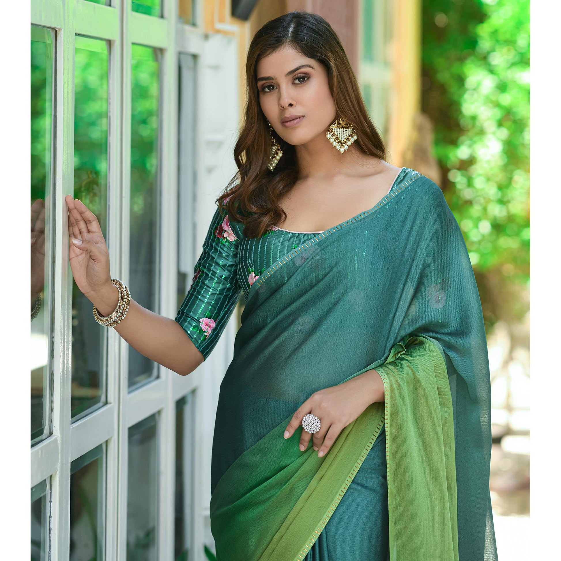 green-solid-chiffon-saree-with-tassels