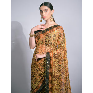 Brown Foil Printed Chiffon Saree With Embroidered Border