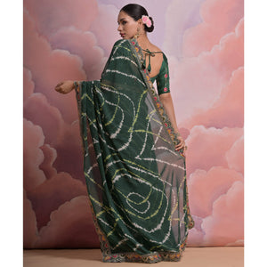 green-printed-with-embroidered-border-georgette-saree