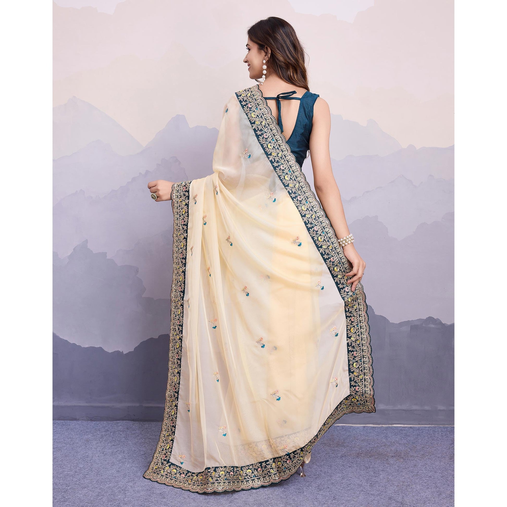 Cream Floral Sequins Embroidered Organza Saree With Lace Border