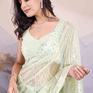 green-sequins-embroidered-twill-net-saree-15