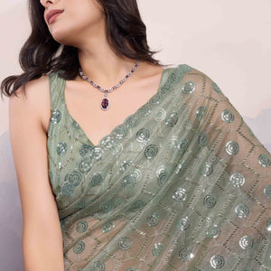 green-sequins-embroidered-twill-net-saree