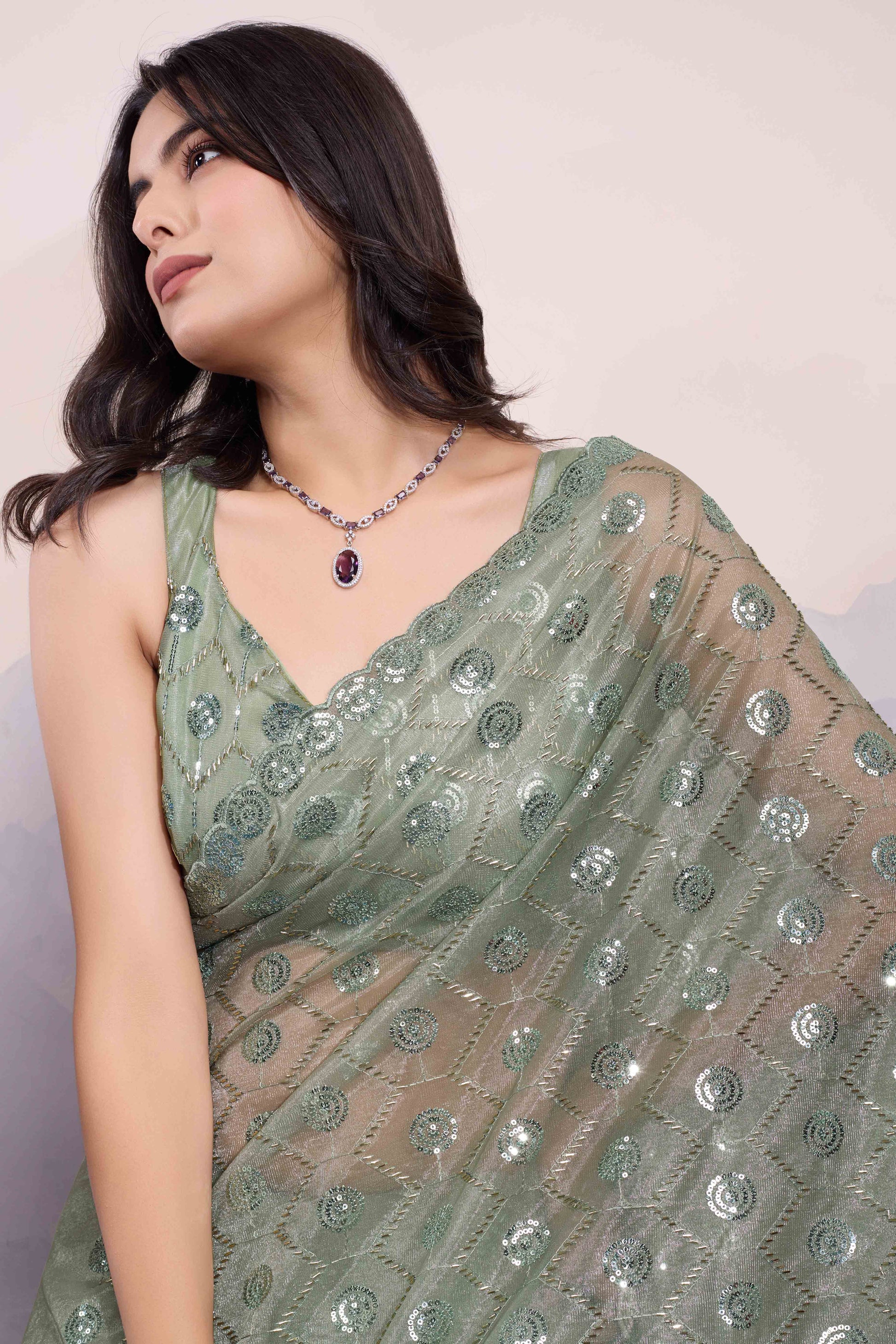 green-sequins-embroidered-twill-net-saree
