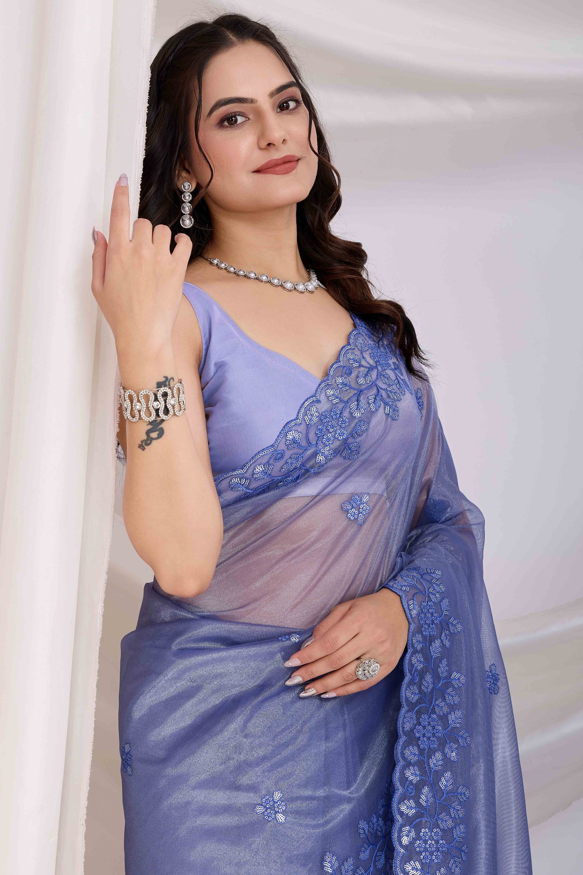 Lavender Floral Sequins Embroidered Twill Net Saree