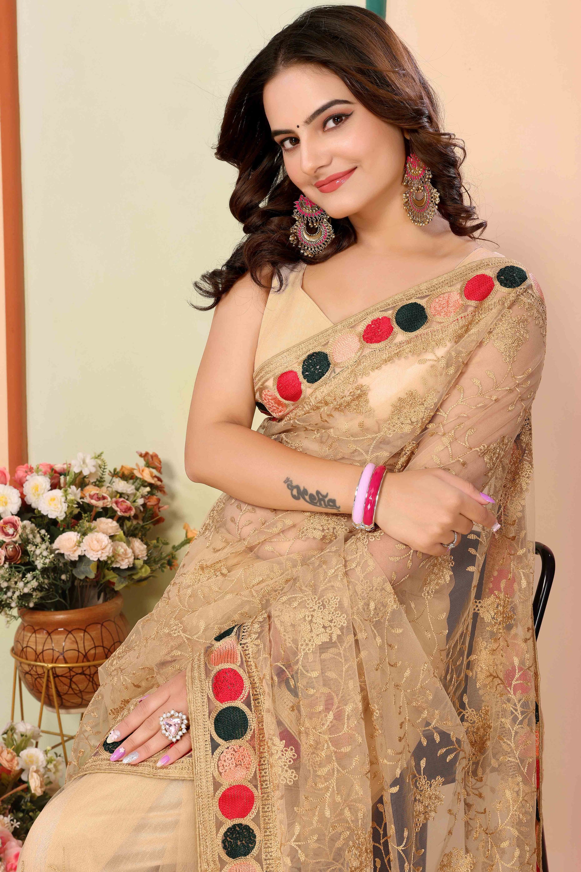 Chikoo Floral Embroidered Net Saree