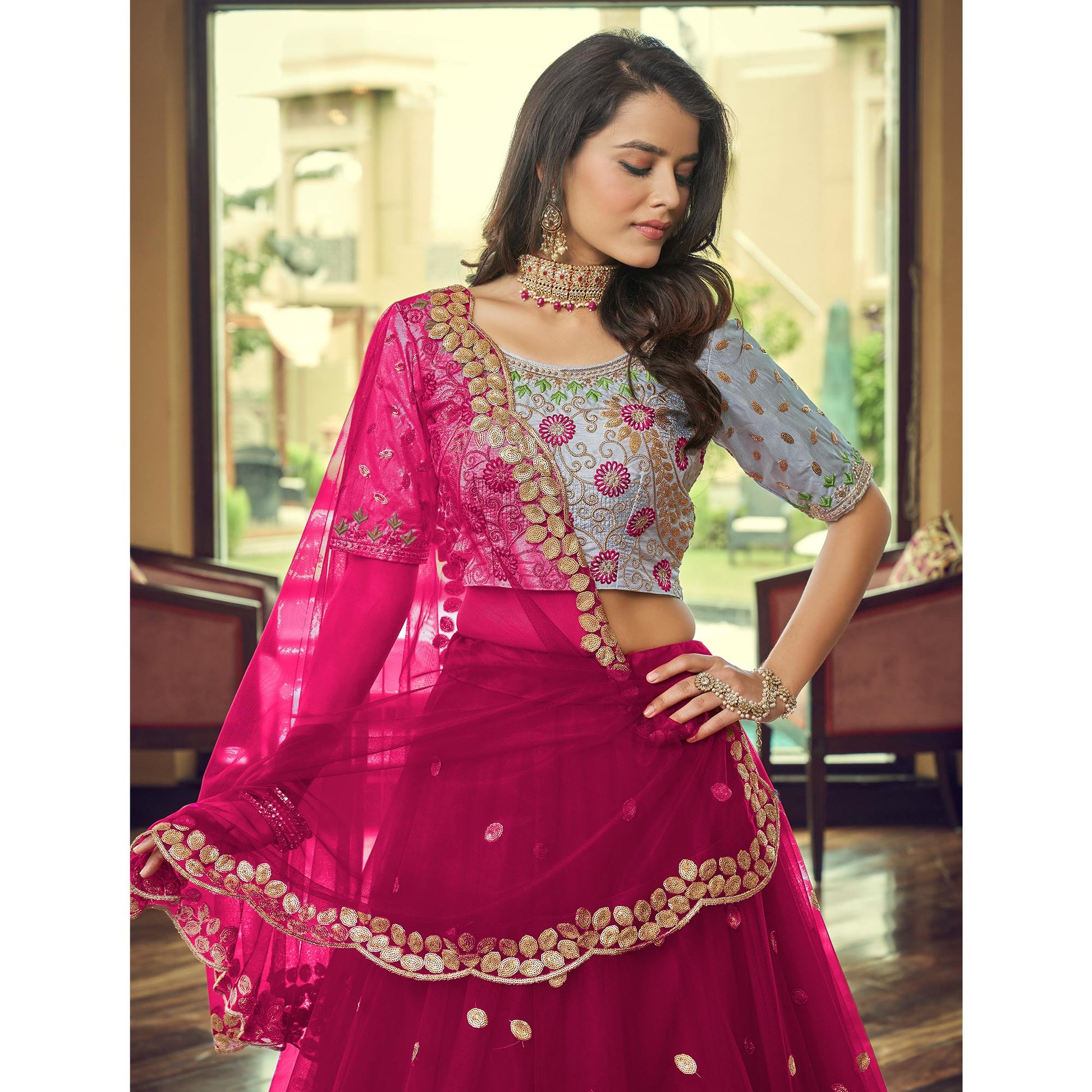 Dark Pink Sequins Embroidered Netted Lehenga Choli