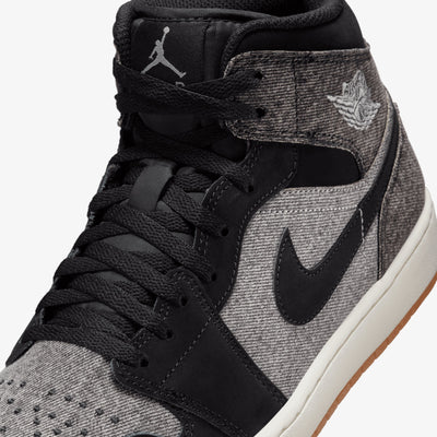 JORDAN | AIR JORDAN 1 MID SE V2 { BLACK/BLACK-SAIL-GUM MED BROWN