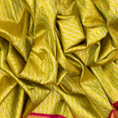 Green Handloom Kanchipuram Tissue Silk Saree With Diamond Motifs