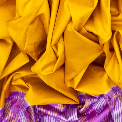 Turmeric Yellow Handloom Ikat Silk Saree With Contrast Lavender Border