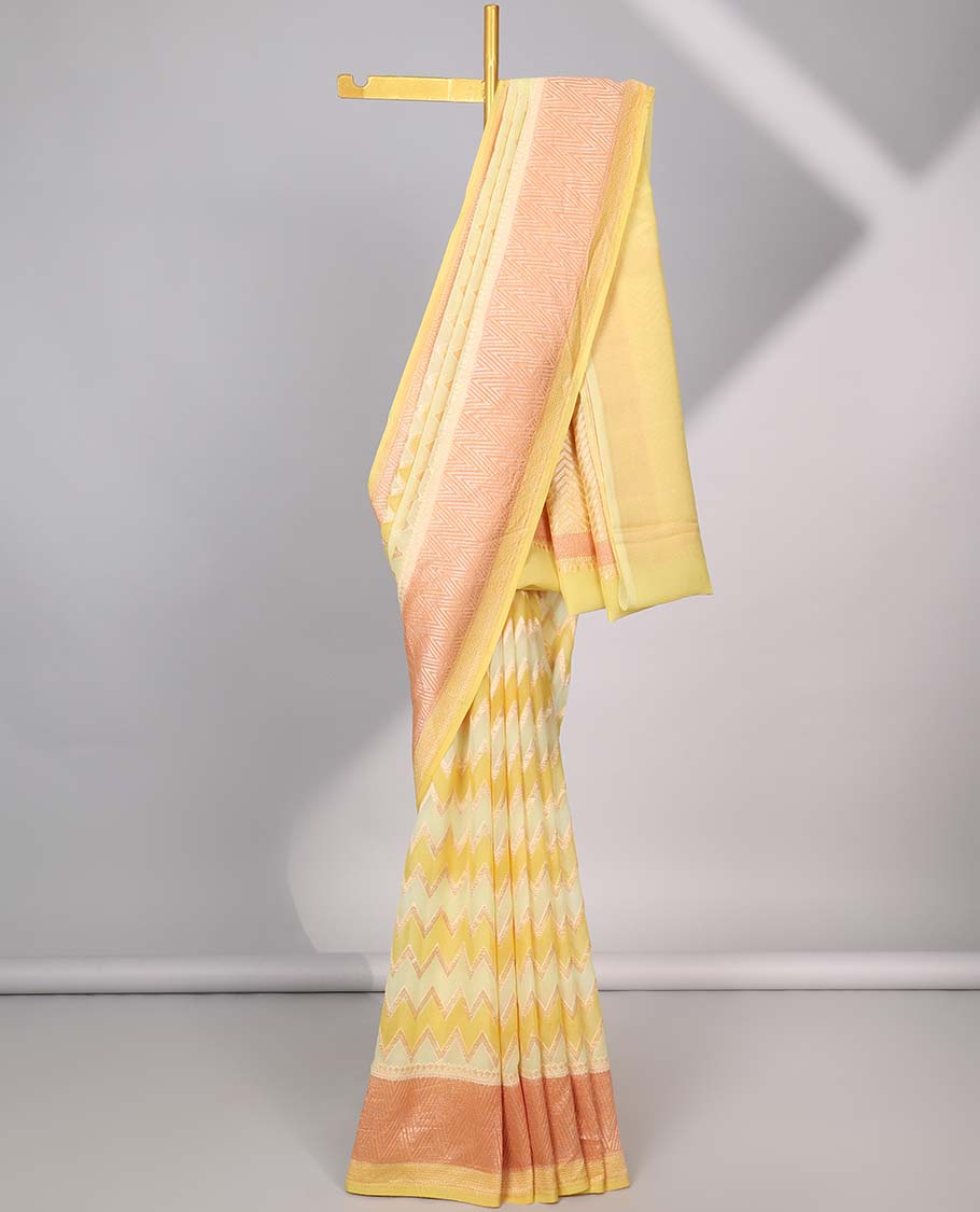 Yellow zig-zag striped banaras georgette saree with contrast border & geometric design pallu