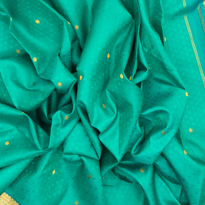 Turquoise Handloom Kanchipuram Silk Saree With Floral Motifs & Rudraksham Buttas