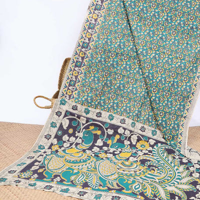 Blue floral machine-printed kalamkari cotton saree, floral & chevron border & peacock pallu