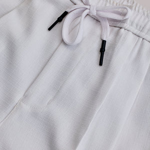 White Textured Relaxed Fit Trousers