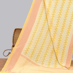 Yellow zig-zag striped banaras georgette saree with contrast border & geometric design pallu