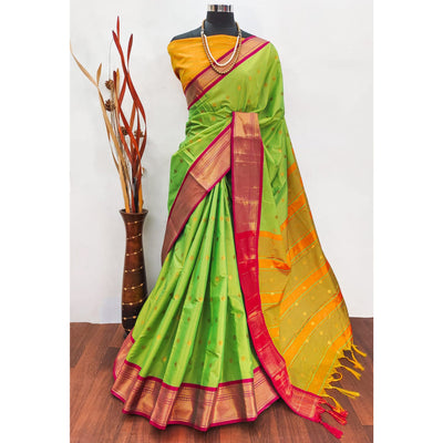 green-zari-woven-lichi-art-silk-saree-with-tassels